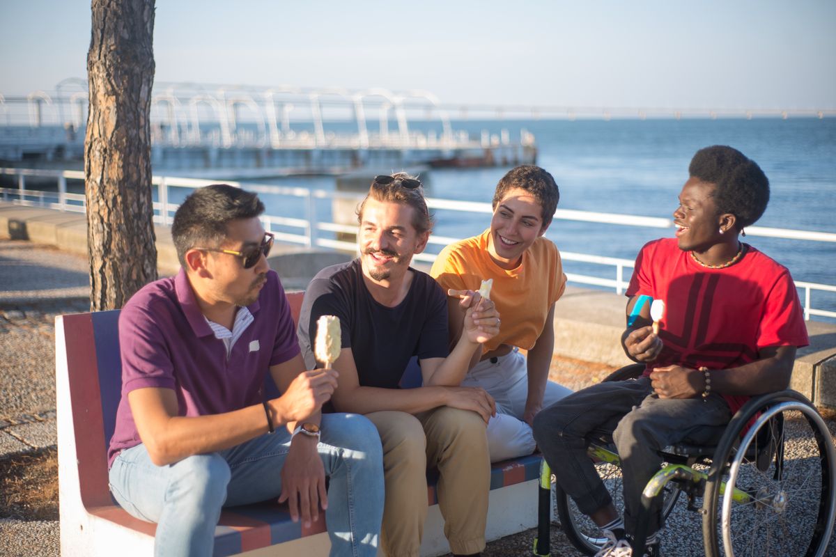 Friends enjoying time together by the seaside