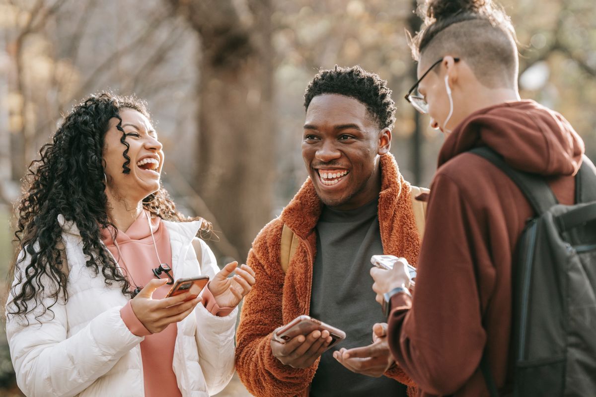 Friends laughing together, representing companionship and social support